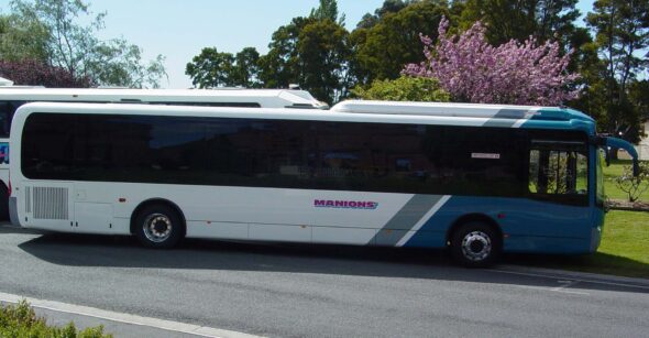 Photo of Manions Buses parked on side of road